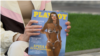 Ирина Белоцерковец держит в руках журнал Playboy со своей фотографией на обложке