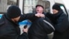 Kazakhstan - Kazakh police detain a protester in Almaty on March 1, 2020. - Police in authoritarian Kazakhstan detained more than 60 people in the Central Asian country's largest city on March 1, after an activist's death in jail triggered diplomatic cond