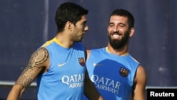 Luis Suarez və Arda Turan