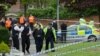 U.K. -- Police officers man a cordoned off area in Woolwich, east London following an incident in which a man was killed and two others seriously injured, 22May2013