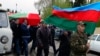 Nagorno-Karabakh -- Men carry the coffin of an Azerbaijan's serviceman, who was killed on April 2 during clashes between Armenian and Azeri forces in Armenian-seized Azerbaijani region of Nagorny Karabakh, during his funeral in Terter on April 3, 2016. 